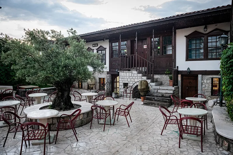 Outdoor sitting at the Lanterna old tavern in the center of Podgorica, Montenegro