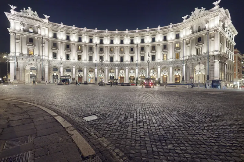 A night view of the Anantara Palazzo Naiadi Rome Hotel from Piazza della Repubblica, in the center of Rome, Italy