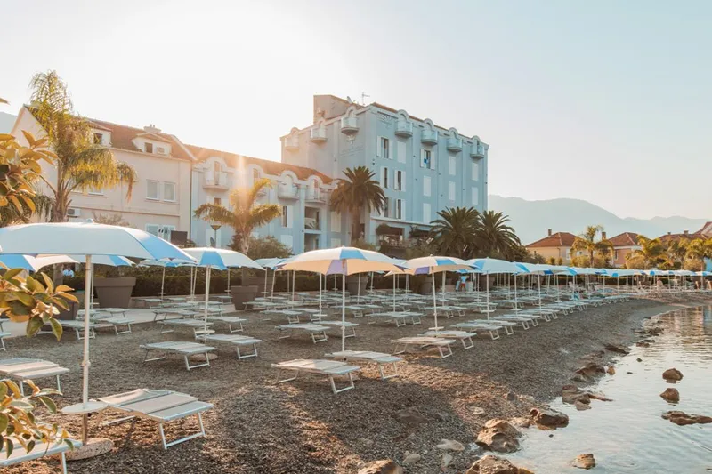 The private beach of Hotel Palma on the seafront of Kotor Bay, Montenegro 