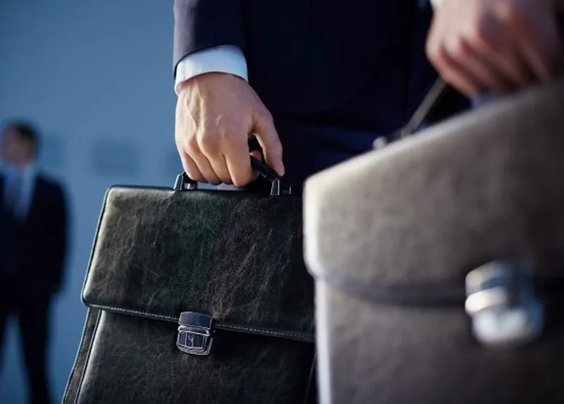 Lawyer holding a suitcase