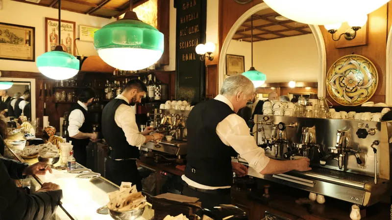 Your typical Italian café with baristas preparing espresso